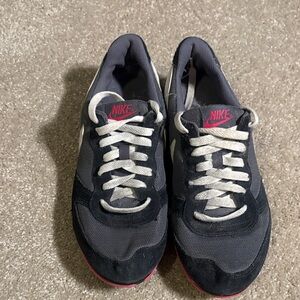 Nike Black and Pink Sneakers with White Swoosh